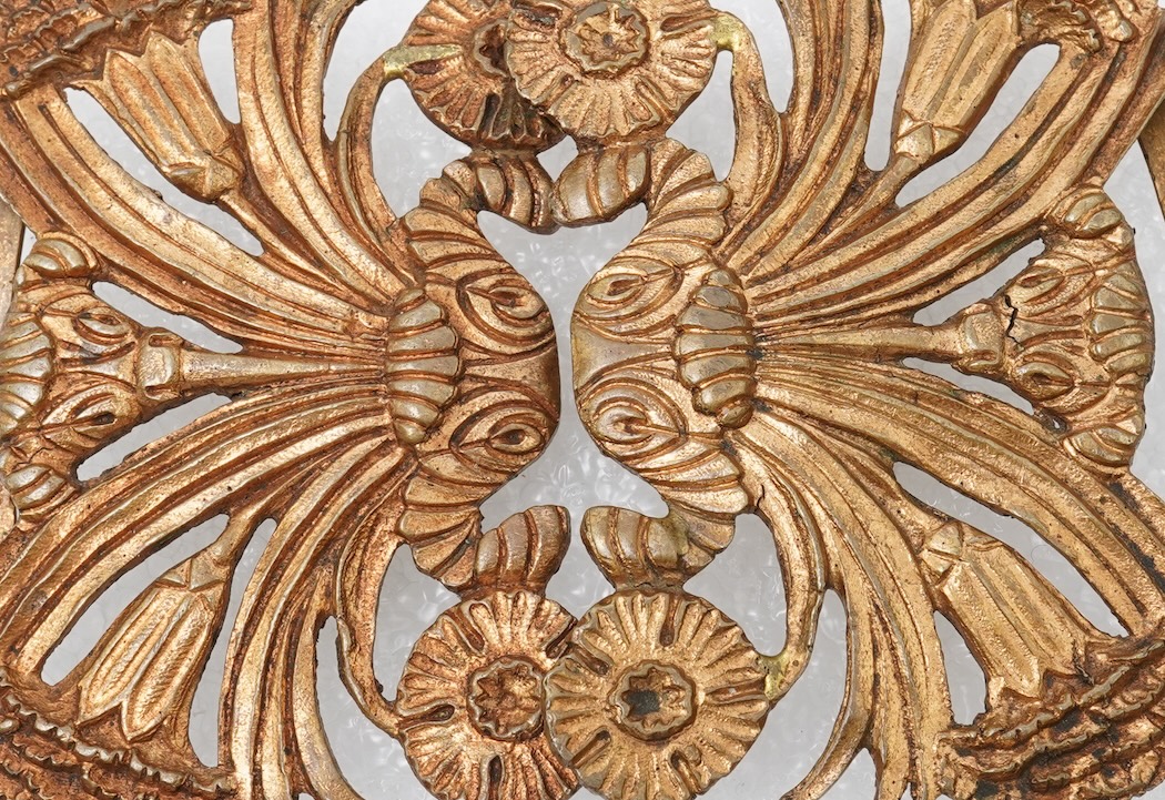 Line Vautrin, a gilt bronze belt buckle